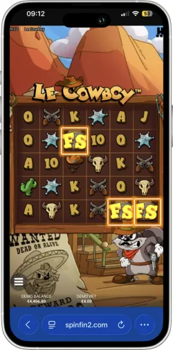 Le Cowboy slot showing FS scatter symbols landing on reels